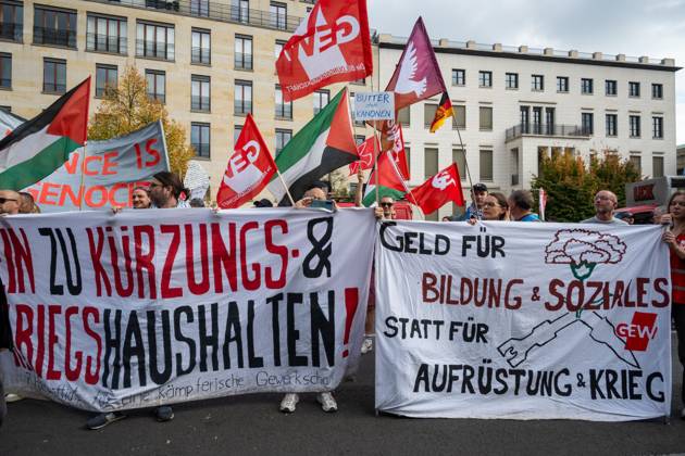 October 3, 2026, Berlin, Germany: BERLIN, GERMANY Ã¢â‚¬ OCTOBER 3, 2026: Thousands of people took part in a peace demonstration in central Berlin on German Unity Day. A coalition of peace initiatives, trade unions, and political and civil-society groups organized the protest. The demonstrators focused on military rearmament, the possible reintroduction of conscription, and GermanyÃ¢â‚¬â ¢s military policy. The march began at the Brandenburg Gate and continued through the government district before concluding with a rally. The demonstration brought together participants expressing opposition to GermanyÃ¢â‚¬â ¢s current and proposed military policies on a national public holiday. Berlin Germany - ZUMAq101 20261003_zna_q101_093 Copyright: xJessxFlomx