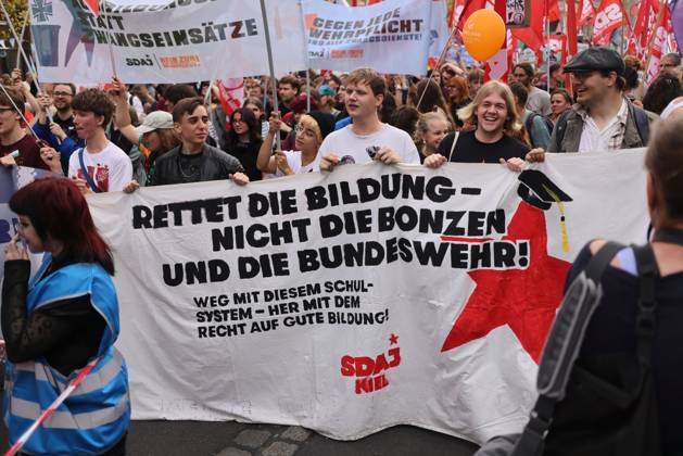 October 3, 2026, Berlin, Berlin, Germany: BERLIN, GERMANY, OCTOBER 3, 2026: Thousands of demonstrators march through central Berlin during a protest against Germany s military buildup, increased defense spending and the possible reintroduction of compulsory military service. Protesters called for greater investment in healthcare, housing, education and other social services instead of military spending, while participants also demonstrated against German arms deliveries and support for Israel amid the war in Gaza. The march began at the Brandenburg Gate and continued through central Berlin before returning to the area. Berlin Germany - ZUMAq101 20261003_zna_q101_218 Copyright: xZairaxBiaginix