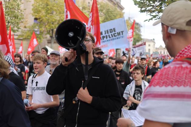 October 3, 2026, Berlin, Berlin, Germany: BERLIN, GERMANY, OCTOBER 3, 2026: Thousands of demonstrators march through central Berlin during a protest against Germany s military buildup, increased defense spending and the possible reintroduction of compulsory military service. Protesters called for greater investment in healthcare, housing, education and other social services instead of military spending, while participants also demonstrated against German arms deliveries and support for Israel amid the war in Gaza. The march began at the Brandenburg Gate and continued through central Berlin before returning to the area. Berlin Germany - ZUMAq101 20261003_zna_q101_219 Copyright: xZairaxBiaginix