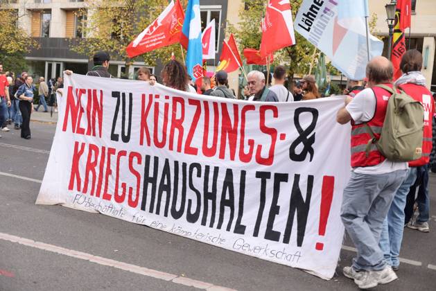 October 3, 2026, Berlin, Berlin, Germany: BERLIN, GERMANY, OCTOBER 3, 2026: Thousands of demonstrators march through central Berlin during a protest against Germany s military buildup, increased defense spending and the possible reintroduction of compulsory military service. Protesters called for greater investment in healthcare, housing, education and other social services instead of military spending, while participants also demonstrated against German arms deliveries and support for Israel amid the war in Gaza. The march began at the Brandenburg Gate and continued through central Berlin before returning to the area. Berlin Germany - ZUMAq101 20261003_zna_q101_225 Copyright: xZairaxBiaginix