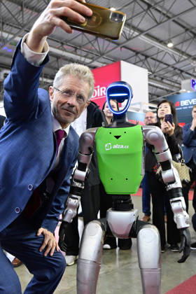 Czech Senate President Milos Vystrcil takes a selfie with a humanoid robot at opening of the 67th International Engineering Fair, which begins at Vystaviste 1 exhibition grounds in Brno, Czech Republic, on October 6th, 2026. International Fair of Machine Tools and Forming Machines IMT, International Welding Engineering Fair Welding, International Fair of Plastics, Rubber and Composites Plastex, International Fair of Surface Treatment Technologies Profintech and International Foundry Fair Fond-Ex also start. (CTKxPhoto VaclavxSalek) CTKPhotoP2026100605271 CTKPhotoP2026100605271