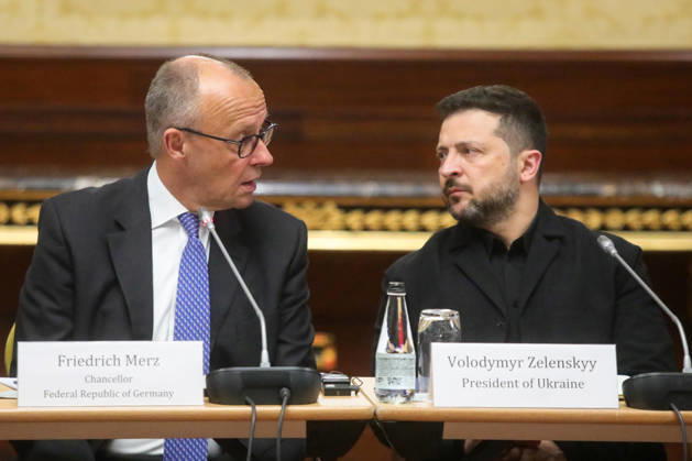 RECORD DATE NOT STATED Ukrainian President Volodymyr Zelenskyy (R) and German Federal Chancellor Friedrich Merz, who arrived in the capital on a visit, attend the Ukrainian-German Business Forum in Kyiv, Ukraine, on October 4, 2026. During the event, the Ukrainian and German sides signed a number of cooperation documents in the energy and defense-industrial sectors, including agreements concerning the procurement and supply of missiles for IRIS-T systems (Photo by Volodymyr Tarasov Ukrinform) Volodymyr Zelenskyy and Friedrich Merz attend Ukrainian-German Business Forum  Copyright: xVolodymyrxTarasovx
