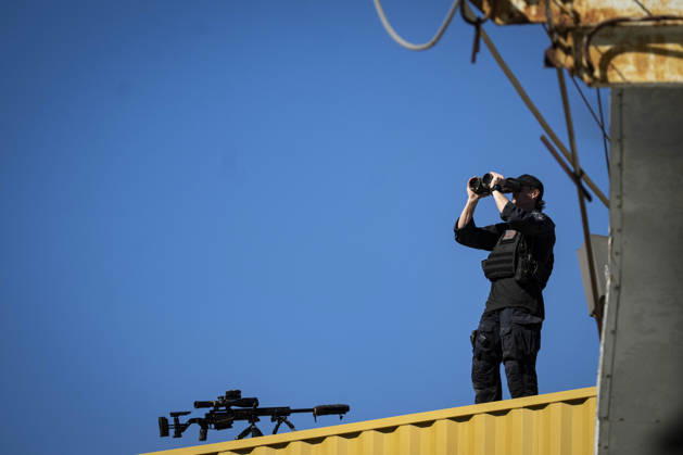 A member of US Secret Service Counter Sniper (CS) keeps watch during an event at Tradepoint Atlantic in Sparrows Point, Maryland on Tuesday, Oct. 6, 2026. Anduril is in advanced talks to build an autonomous surface-vessel factory at Tradepoint Atlantic, which would give the company an East Coast hub alongside its Foss Maritime shipyard in Seattle and undersea-vehicle factory at Quonset Business Park in Rhode Island. BAL20261006116 AlxDrago