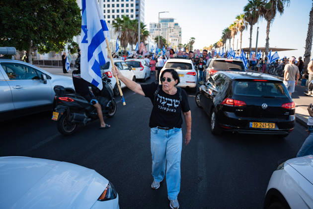 October 7, 2026, Tel Aviv, Tel Aviv, Israel: A protester blocks the road near the beach in protest against the Israeli government on the third anniversary of October 7th. Tel Aviv Israel - ZUMAg280 20261007_znp_g280_005 Copyright: xYoavxGinsburgx
