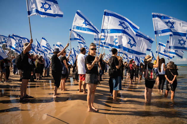 October 7, 2026, Tel Aviv, Tel Aviv, Israel: Activists carry flags at the beach in protest against the Israeli government on the third anniversary of October 7th. Tel Aviv Israel  - ZUMAg280 20261007_znp_g280_009 Copyright: xYoavxGinsburgx