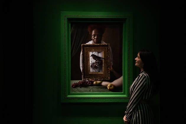 Tim Walker s Fairyland: Love and Legends Photo Call at National Portrait Gallery, London, UK - 7 October 2026 A staff member views Olivette Cole-Wilson, and blackbird by Tim Walker as part of The National Portrait Gallery s Tim Walker s Fairyland: Love and Legends Exhibition which runs from 9th October 2026 - 7th February 2027 at National Portrait Gallery in London, England, UK on Wednesday 7 October, 2026., Credit:Justin Ng Avalon UK, England, London, National Portrait Gallery Copyright: xJustinxNgx xAvalonx 1141202413