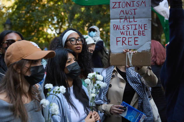 October 7, 2026, New York, New York, USA: A demonstrator holds a sign reading ZIONISM MUST FALL PALESTINE WILL BE FREE during a pro-Palestinian protest at City Hall Park in New York City. New York USA - ZUMAs237 20261007_aap_s237_021 Copyright: xMarkxJ.xSullivanx