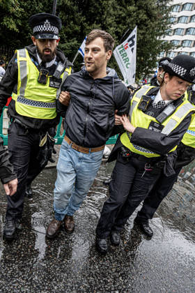Pro-Israeil counter protestors challenge pro-Palestine demonstrators in London, UK - 7 OCT 2026. A pro-Israeli counter-protestor is arrested for breaching the peace and not maintaining sufficient distance from pro-Palestine demonstrators. Pro-Palestine activists from Central London Universities chose the 3rd anniversary of the October 7th attack by Hamas to protest against Israel’s war on Gaza. They clashed en route with pro-Israeli counter protestors. The demonstration was arranged by an inter-uni coalition that includes King’s College and LSE. London United Kingdom Copyright: xLabxMox xSOPAxImagesx LabMO_Oct_7th_Uni_Protest_SOPA_15