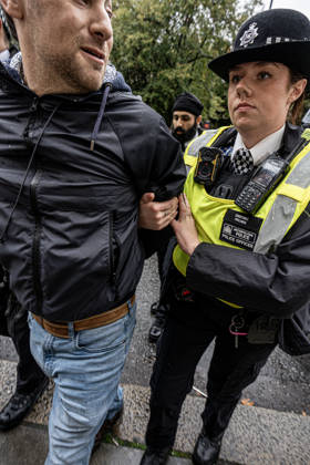 Pro-Israeil counter protestors challenge pro-Palestine demonstrators in London, UK - 7 OCT 2026. A pro-Israeli counter-protestor is arrested for breaching the peace and not maintaining sufficient distance from pro-Palestine demonstrators. Pro-Palestine activists from Central London Universities chose the 3rd anniversary of the October 7th attack by Hamas to protest against Israel’s war on Gaza. They clashed en route with pro-Israeli counter protestors. The demonstration was arranged by an inter-uni coalition that includes King’s College and LSE. London United Kingdom Copyright: xLabxMox xSOPAxImagesx LabMO_Oct_7th_Uni_Protest_SOPA_16