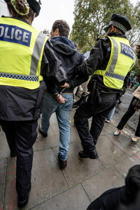 Pro-Israeil counter protestors challenge pro-Palestine demonstrators in London, UK - 7 OCT 2026. A pro-Israeli counter-protestor is arrested for breaching the peace and not maintaining sufficient distance from pro-Palestine demonstrators. Pro-Palestine activists from Central London Universities chose the 3rd anniversary of the October 7th attack by Hamas to protest against Israel’s war on Gaza. They clashed en route with pro-Israeli counter protestors. The demonstration was arranged by an inter-uni coalition that includes King’s College and LSE. London United Kingdom Copyright: xLabxMox xSOPAxImagesx LabMO_Oct_7th_Uni_Protest_SOPA_17