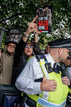 Pro-Israeil counter protestors challenge pro-Palestine demonstrators in London, UK - 7 OCT 2026. Protesters seen chanting slogans while holding placards behind the police man during the protest against Israel’s war on Gaza. Pro-Palestine activists from Central London Universities chose the 3rd anniversary of the October 7th attack by Hamas to protest against Israel’s war on Gaza. They clashed en route with pro-Israeli counter protestors. The demonstration was arranged by an inter-uni coalition that includes King’s College and LSE. London United Kingdom Copyright: xLabxMox xSOPAxImagesx LabMO_Oct_7th_Uni_Protest_SOPA_20