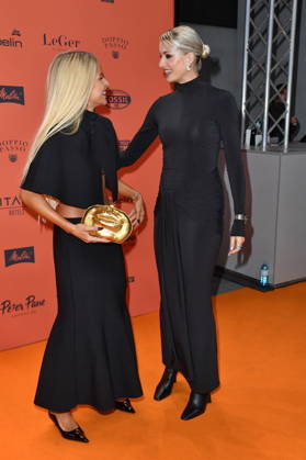 ABOUT YOU Opera Modenschau Caro Daur und Lena Gercke bei der ABOUT YOU Opera Modenschau in Berlin am 07.10.2026 Copyright: xEventpressxBerndtx