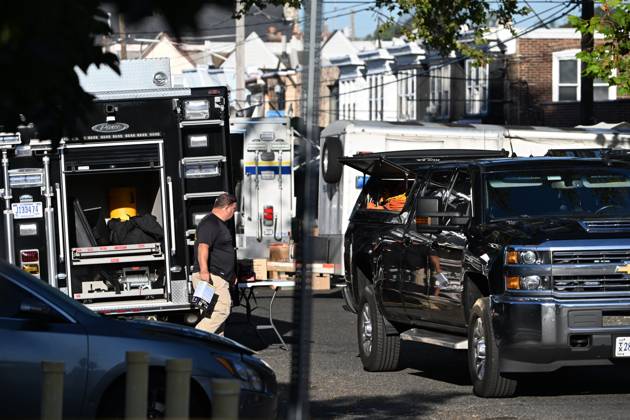 October 7, 2026, Philadelphia, Pennsylvania, USA: FBI agents seize evidence from the home of Eugene Horsch on West Chew Avenue in Philadelphia, Pennsylvania, United States, on October 7, 2026. Several evidence boxes and bags are visible, including one labeled drain trap and liquid contents. Authorities are investigating the property after linking it to at least seven missing women. Eugene Horsch is the son of the late Raymond R.C. Horsch. Philadelphia USA - ZUMAs197 20261007_aaa_s197_634 Copyright: xKylexMazzax