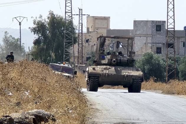 Israeli army conducts raids in Syria s Quneitra countryside QUNEITRA, SYRIA - OCTOBER 8: Israeli forces patrol the village with tanks as they conduct raids in residential areas and fire harassment shots at open areas in the countryside of Quneitra, southern Syria, on October 8, 2026. Huseyin Mesal Anadolu Quneitra Syria. Editorial use only. Please get in touch for any other usage. Copyright: x2026xAnadoluxHuseyinxMesalx