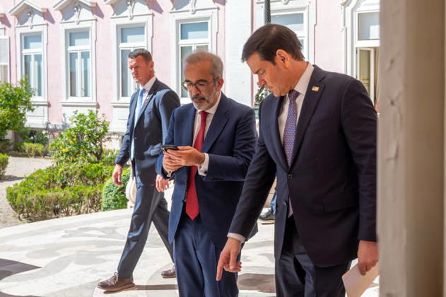 October 8, 2026, Lisbon, Lisbon, Portugal: U.S. Secretary of State MARCO RUBIO, right, and Portugal s Minister of State and Foreign Affairs PAULO RANGEL enter their joint press conference at the Palacio das Necessidades in Lisbon, Portugal, on October 8, 2026. RANGEL checks his phone as the two officials arrive for the media appearance following their bilateral meeting. Lisbon Portugal - ZUMAr238 20261008_zip_r238_005 Copyright: xRicardoxRochax