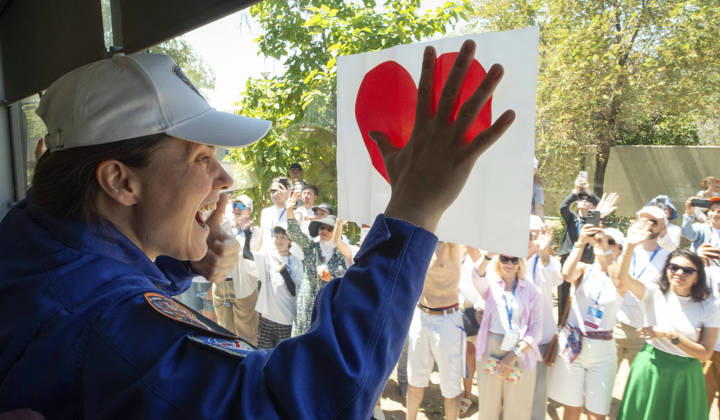 October 8, 2026, Baikonur, Kazakhstan: Baikonur, Kazakhstan. 14 July, 2026. Roscosmos cosmonaut Anna Kikina holds up a heart sign from the bus as she and crewmates Pyotr Dubrov and Anil Menon depart the Cosmonaut Hotel for suit-up, July 14, 2026 in Baikonur, Kazakhstan. The crew launched later that day to the International Space Station. Baikonur Kazakhstan - ZUMAp138 20261008_zaa_p138_003 Copyright: xPavelxShvets Gctcx