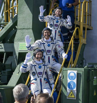October 8, 2026, Baikonur, Kazakhstan: Baikonur, Kazakhstan. 14 July, 2026. Roscosmos cosmonaut Anna Kikina, top, NASA astronaut Anil Menon and Roscosmos cosmonaut Pyotr Dubrov wave farewell before boarding the Soyuz MS-29 spacecraft at the Baikonur Cosmodrome, July 14, 2026 in Baikonur, Kazakhstan. The trio launched to the International Space Station. Baikonur Kazakhstan - ZUMAp138 20261008_zaa_p138_013 Copyright: xBillxIngalls Nasax