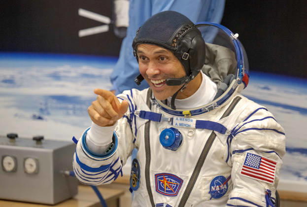 October 8, 2026, Baikonur, Kazakhstan: Baikonur, Kazakhstan. 14 July, 2026. NASA astronaut Anil Menon gestures to family and friends while waiting for his Sokol suit pressure check at the Baikonur Cosmodrome, July 14, 2026 in Baikonur, Kazakhstan. He launched to the International Space Station later that day. Baikonur Kazakhstan - ZUMAp138 20261008_zaa_p138_019 Copyright: xBillxIngalls Nasax