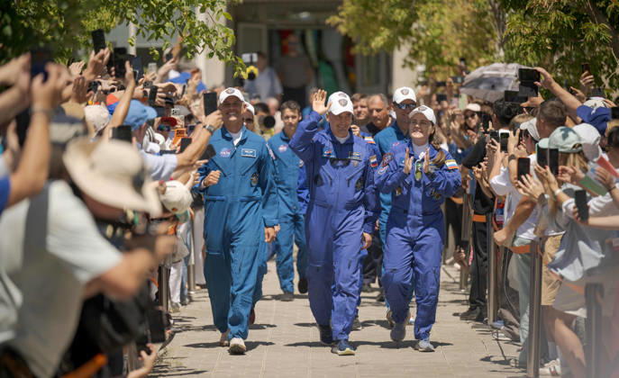 October 8, 2026, Baikonur, Kazakhstan: Baikonur, Kazakhstan. 14 July, 2026. NASA astronaut Anil Menon, left, and Roscosmos cosmonauts Pyotr Dubrov and Anna Kikina walk out of the Cosmonaut Hotel to suit up for their Soyuz launch, July 14, 2026 in Baikonur, Kazakhstan. The crew launched later that day to the International Space Station. Baikonur Kazakhstan - ZUMAp138 20261008_zaa_p138_023 Copyright: xBillxIngalls Nasax
