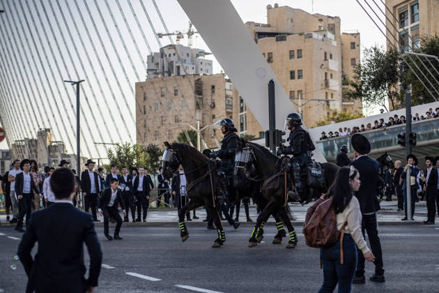 Anti-military service Ultra-Orthodox Jews block road to West Jerusalem JERUSALEM - OCTOBER 8: Mounted Israeli police officers on horseback deployed to the scene intervene against demonstrators as Ultra-Orthodox Jews, known as Haredi, protest the lack of legislation exempting yeshiva students from mandatory military service and the detention of students on grounds of draft evasion in West Jerusalem, Israel, on October 8, 2026. Haredi protesters lie on the road leading to West Jerusalem and block traffic. Mostafa Alkharouf Anadolu Jerusalem Israel. Editorial use only. Please get in touch for any other usage.  Copyright: x2026xAnadoluxMostafaxAlkharoufx