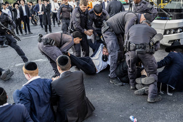 Anti-military service Ultra-Orthodox Jews block road to West Jerusalem JERUSALEM - OCTOBER 8: Israeli police deployed to the scene intervene against the demonstrators as Ultra-Orthodox Jews, known as Haredi, protest the lack of legislation exempting yeshiva students from mandatory military service and the detention of students on grounds of draft evasion in West Jerusalem, on October 8, 2026. Haredi protesters lie on the road leading to West Jerusalem and block traffic. Mostafa Alkharouf Anadolu Jerusalem Israel. Editorial use only. Please get in touch for any other usage.  Copyright: x2026xAnadoluxMostafaxAlkharoufx