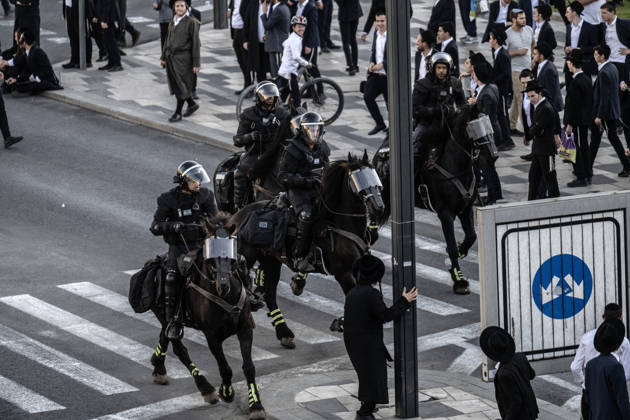 Anti-military service Ultra-Orthodox Jews block road to West Jerusalem JERUSALEM - OCTOBER 8: Mounted Israeli police officers on horseback deployed to the scene intervene against demonstrators as Ultra-Orthodox Jews, known as Haredi, protest the lack of legislation exempting yeshiva students from mandatory military service and the detention of students on grounds of draft evasion in West Jerusalem, Israel, on October 8, 2026. Haredi protesters lie on the road leading to West Jerusalem and block traffic. Mostafa Alkharouf Anadolu Jerusalem Israel. Editorial use only. Please get in touch for any other usage.  Copyright: x2026xAnadoluxMostafaxAlkharoufx