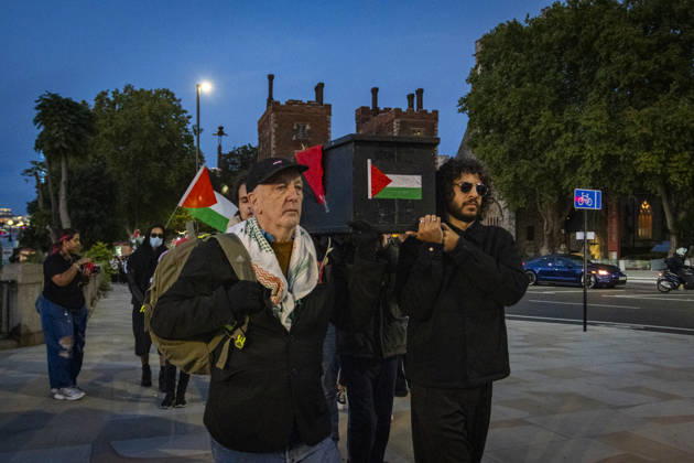 Pro-Palestine Silent Funeral Procession Central London, October 8, 2026 A pro-Palestine silent funeral procession took place in Central London, with demonstrators walking in silence to remember Palestinians killed in the conflict in Gaza. Participants carried Palestinian flags and placards, while some held a coffin and others carried effigies wrapped in burial shrouds, symbolising those killed in the conflict., Credit:Zak Irfan Avalon Copyright: xZakxIrfanx xAvalonx 1141551868