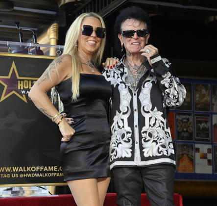 Russell Hitchcock of the rock duo Air Supply is joined by his wife Cari Hitchcock during an unveiling ceremony honoring the duo with the 2,859th star on the Hollywood Walk of Fame in Los Angeles on Thursday October 8, 2026.  LAP20261008016 JIMxRUYMEN