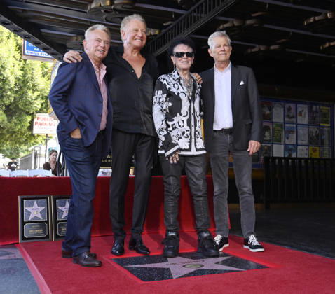 Pat Sajak, honorees Graham Russell, Russell Hitchcock and David Foster (L-R) pose during an unveiling ceremony honoring the rock duo Air Supply with the 2,859th star on the Hollywood Walk of Fame in Los Angeles on Thursday October 8, 2026.  LAP2026100808 JIMxRUYMEN