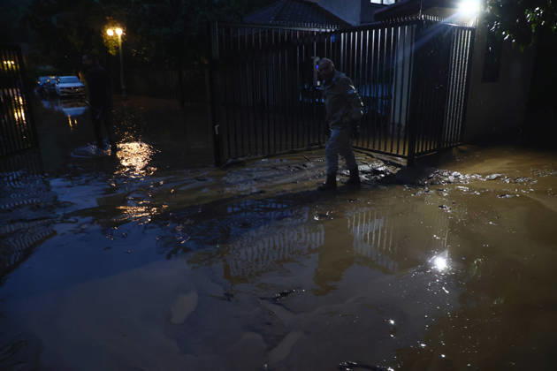 Santiago, October 8, 2026: A mudslide is affecting the area from San Carlos de Apoquindo to Los Dominicos in the Las Condes district, causing widespread damage and sweeping away vehicles and people. Dragomir Yankovic Aton, Chile, Santiago, Chile Aton 1197961  Copyright: DRAGOMIRxYANKOVIC ATONxCHILE