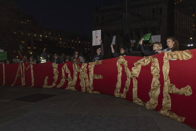 October 8, 2026, New York, New York, USA: Demonstrators hold a large banner that reads I AM JANE DOE joining hundreds at a rally in Foley Square outside the New York State Supreme Court building in Lower Manhattan under the banner . StopSexualViolence: From the Frat House to the White House. The protest is one of many rallies and campus walkouts around the country demanding justice for Cornell s Jane Doe. New York USA  - ZUMAr174 20261008_znp_r174_002 Copyright: xGinaxMxRandazzox