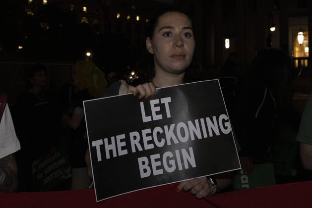 October 8, 2026, New York, New York, USA: A demonstrator holds a sign that reads LET THE RECKONING BEGIN joining hundreds at a rally in Foley Square outside the New York State Supreme Court building in Lower Manhattan under the banner . StopSexualViolence: From the Frat House to the White House. The protest is one of many rallies and campus walkouts around the country demanding justice for Cornell s Jane Doe. New York USA - ZUMAr174 20261008_znp_r174_009 Copyright: xGinaxMxRandazzox