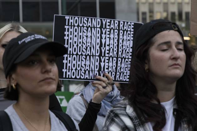 October 8, 2026, New York, New York, USA: A demonstrator holds a sign that reads THOUSAND YEAR RAGE joining hundreds at a rally in Foley Square outside the New York State Supreme Court building in Lower Manhattan under the banner . StopSexualViolence: From the Frat House to the White House. The protest is one of many rallies and campus walkouts around the country demanding justice for Cornell s Jane Doe. New York USA - ZUMAr174 20261008_znp_r174_014 Copyright: xGinaxMxRandazzox