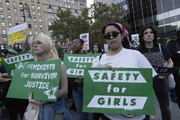 October 8, 2026, New York, New York, USA: Demonstrators hold signs that read SAFETY for GIRLS FEMINISTS for SURVIVOR JUSTICE joining hundreds at a rally in Foley Square outside the New York State Supreme Court building in Lower Manhattan under the banner . StopSexualViolence: From the Frat House to the White House. The protest is one of many rallies and campus walkouts around the country demanding justice for Cornell s Jane Doe. New York USA  - ZUMAr174 20261008_znp_r174_037 Copyright: xGinaxMxRandazzox