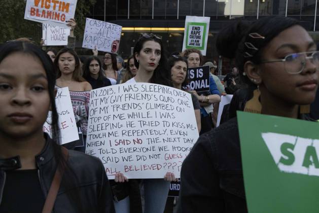 October 8, 2026, New York, New York, USA: A demonstrator holds a sign that reads IN 2013, I WAS SLEEPING OVER AT MY GUY FRIEND S QUAD. ONE OF MY FRIENDS CLIMBED ON TOP OF ME WHILE I WAS SLEEPING HE TRIED TO KISS ME and TOUCH ME REPEATEDLY, EVEN WHEN I SAID NO. THE NEXT DAY HE TOLD EVERYONE WE HOOKED UP I SAID WE DID NOT GUESS WHO ALL BELIEVED???? joining hundreds at a rally in Foley Square outside the New York State Supreme Court building in Lower Manhattan under the banner . StopSexualViolence: From the Frat House to the White House. The protest is one of many rallies and campus walkouts around the country demanding justice for Cornell s Jane Doe. New York USA  - ZUMAr174 20261008_znp_r174_038 Copyright: xGinaxMxRandazzox