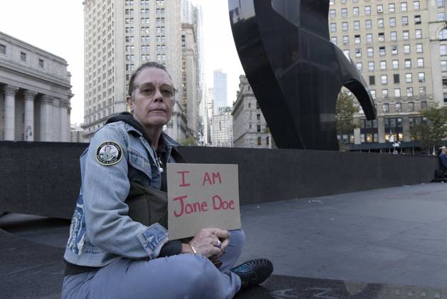 October 8, 2026, New York, New York, USA: A demonstrator holds a sign that reads I AM Jane Doe joining hundreds at a rally in Foley Square outside the New York State Supreme Court building in Lower Manhattan under the banner . StopSexualViolence: From the Frat House to the White House. The protest is one of many rallies and campus walkouts around the country demanding justice for Cornell s Jane Doe. New York USA - ZUMAr174 20261008_znp_r174_031 Copyright: xGinaxMxRandazzox