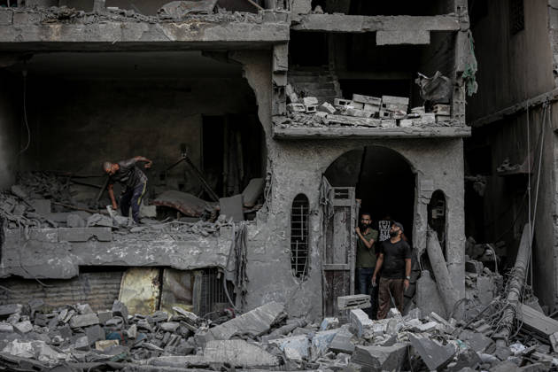 Israeli army continues its attacks on Gaza despite the ceasefire GAZA CITY, PALESTINE - OCTOBER 9: Palestinian civilians and emergency responders search through the debris of damaged residential buildings following an Israeli military airstrike in the Sabra neighborhood, south of Gaza City, Palestine on October 9, 2026. Multiple dead and wounded, including women and children, were reported as rescue teams worked under severe resource shortages to extract survivors from beneath destroyed structures. Saeed M. M. T. Jaras Anadolu Gaza City Gaza. Editorial use only. Please get in touch for any other usage.  Copyright: x2026xAnadoluxSaeedxM.xM.xT.xJarasx