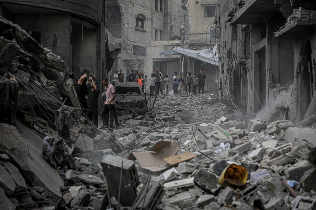 Israeli army continues its attacks on Gaza despite the ceasefire GAZA CITY, PALESTINE - OCTOBER 9: Palestinian civilians and emergency responders search through the debris of damaged residential buildings following an Israeli military airstrike in the Sabra neighborhood, south of Gaza City, Palestine on October 9, 2026. Multiple dead and wounded, including women and children, were reported as rescue teams worked under severe resource shortages to extract survivors from beneath destroyed structures. Saeed M. M. T. Jaras Anadolu Gaza City Gaza. Editorial use only. Please get in touch for any other usage.  Copyright: x2026xAnadoluxSaeedxM.xM.xT.xJarasx