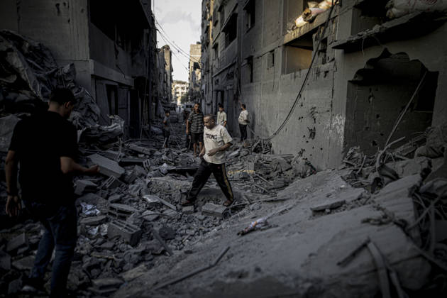 Israeli army continues its attacks on Gaza despite the ceasefire GAZA CITY, PALESTINE - OCTOBER 9: Palestinian civilians and emergency responders search through the debris of damaged residential buildings following an Israeli military airstrike in the Sabra neighborhood, south of Gaza City, Palestine on October 9, 2026. Multiple dead and wounded, including women and children, were reported as rescue teams worked under severe resource shortages to extract survivors from beneath destroyed structures. Saeed M. M. T. Jaras Anadolu Gaza City Gaza. Editorial use only. Please get in touch for any other usage.  Copyright: x2026xAnadoluxSaeedxM.xM.xT.xJarasx