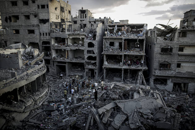Israeli army continues its attacks on Gaza despite the ceasefire GAZA CITY, PALESTINE - OCTOBER 9: A general view of the destruction as Palestinian civilians and emergency responders search through the debris of damaged residential buildings following an Israeli military airstrike in the Sabra neighborhood, south of Gaza City, Palestine on October 9, 2026. Multiple dead and wounded, including women and children, were reported as rescue teams worked under severe resource shortages to extract survivors from beneath destroyed structures. Saeed M. M. T. Jaras Anadolu Gaza City Gaza. Editorial use only. Please get in touch for any other usage.  Copyright: x2026xAnadoluxSaeedxM.xM.xT.xJarasx