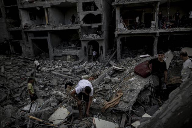 Israeli army continues its attacks on Gaza despite the ceasefire GAZA CITY, PALESTINE - OCTOBER 9: Palestinian civilians and emergency responders search through the debris of damaged residential buildings following an Israeli military airstrike in the Sabra neighborhood, south of Gaza City, Palestine on October 9, 2026. Multiple dead and wounded, including women and children, were reported as rescue teams worked under severe resource shortages to extract survivors from beneath destroyed structures. Saeed M. M. T. Jaras Anadolu Gaza City Gaza. Editorial use only. Please get in touch for any other usage.  Copyright: x2026xAnadoluxSaeedxM.xM.xT.xJarasx