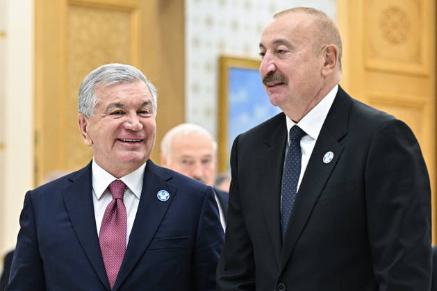 TURKMENISTAN, BALKAN PROVINCE - OCTOBER 9, 2026: Uzbekistan s President Shavkat Mirziyoyev (L) and Azerbaijan s President Ilham Aliyev ahead of a photo op for participants of a meeting of the CIS Council of Heads of State in Turkmenbasy Turkmenistan  - ZUMAt113 20261009_zaa_t113_021 Copyright: xSergeixBobylevx