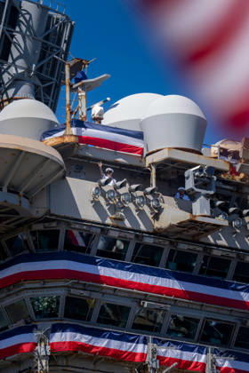 October 8, 2026, Coronado, California, United States: A U.S. Navy sailor waves from the island of the aircraft carrier USS Abraham Lincoln (CVN 72) as the ship returns to Naval Air Station North Island in Coronado, California, on October 8, 2026, following a deployment. Coronado United States - ZUMAg374 20261008_znp_g374_007 Copyright: xLoganxGrahamx