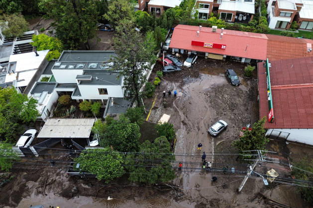 Santiago, October 9, 2026: Consequences of a mudslide that affected the area from San Carlos de Apoquindo to Los Dominicos in the Las Condes district, causing widespread damage and sweeping away vehicles and people. Diego Martin Aton, Chile, Aton 1198131 jpeg  Copyright: DIEGOxMARTIN ATONxCHILE