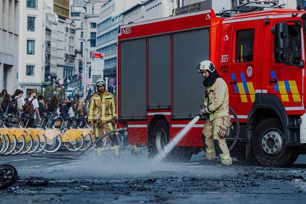Fire fighters pictured in action after a national manifestation against the Federal Government s budgetary measures, under the Keep your hands out of our pockets! (Blijf uit onze zakken! - Pas dans nos poches) moniker, organised by the trade unions on Friday 9 October 2026 in Brussels.  EMILExWINDAL 189265704