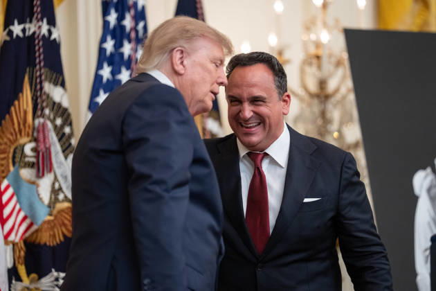President Donald Trump embraces singer Christopher Macchio during an event in the East Room of the White House in Washington, DC on Friday, Oct. 9, 2026. Trump is hosting a Columbus Day celebration. WASP20261009108 AaronxSchwartz