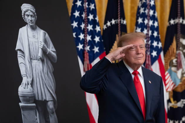 President Donald Trump salutes during the National Anthem during an event in the East Room of the White House in Washington, DC on Friday, Oct. 9, 2026. Trump is hosting a Columbus Day celebration.  WASP20261009113 AaronxSchwartz
