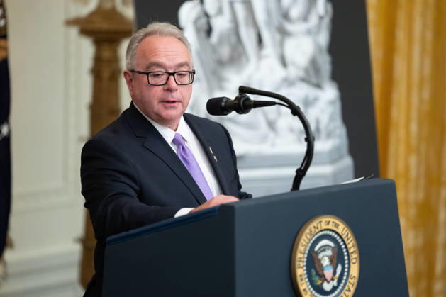 Brett Rugo, founder of Rugo Stone which constructed a helipad on the South Lawn, gives remarks during a Columbus Day Celebration hosted by United States President Donald J Trump in the East Room of the White House in Washington, DC, USA on Friday, October 8, 2026. Copyright: xAaronxSchwartz PoolxviaxCNPx MediaPunchx