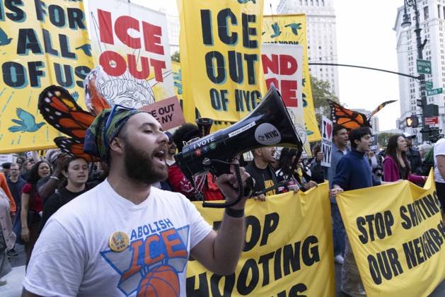 October 9, 2026, New York, New York, USA: Demonstrators march through the streets of Lower Manhattan holding banners that read ICE OUT ICE OUT OF NYC STOP SHOOTING OUR NEIGHBORS at the Hands Off NYC coalition emergency protest demanding justice the day following ICE shooting a Bronx man while his 5 year child was in the car. New York USA  - ZUMAr174 20261009_znp_r174_027 Copyright: xGinaxMxRandazzox