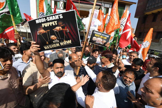 October 10, 2026, Srinagar, Jammu And Kashmir, India: Police personnel try to stop supporters of the opposition alliance INDIA bloc (Indian National Developmental Inclusive Alliance) during a protest demanding the resignation of India s Chief Election Commissioner Gyanesh Kumar over alleged voter roll irregularities linked to the special intensive revision (SIR), in Srinagar on October 10, 2026. Srinagar India  - ZUMAz120 20261010_zip_z120_004 Copyright: xBasitxZargarx